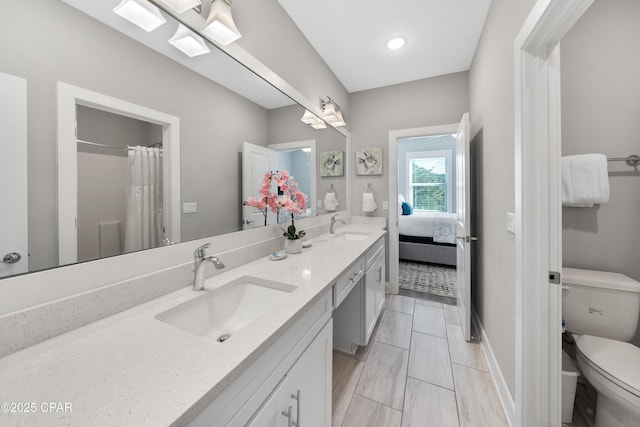 173 W Willow Mist Rd, Inlet Beach, FL 32461 - bathroom with double vanity, toilet, baseboards, connected bathroom, and curtained shower