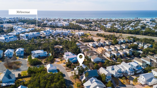 aerial view featuring a residential view and a water view