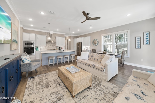 173 W Willow Mist Rd, Inlet Beach, FL 32461 - living room with ornamental molding, ceiling fan, wood finished floors, recessed lighting, and baseboards
