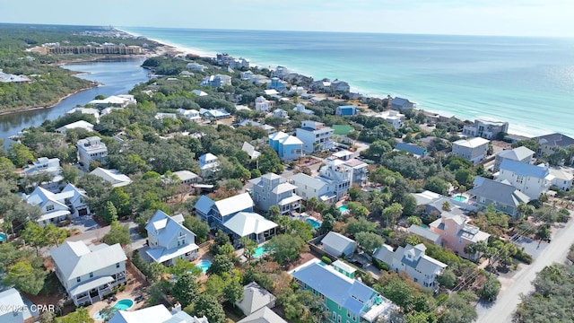 bird's eye view with a water view