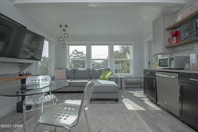 sunroom / solarium featuring light hardwood / wood-style flooring