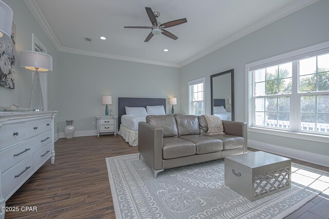 bedroom featuring hardwood / wood-style flooring and crown molding