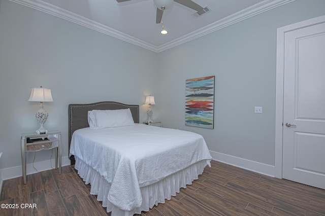 bedroom with crown molding, ceiling fan, and dark hardwood / wood-style floors