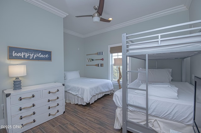 bedroom featuring crown molding, dark wood-type flooring, and ceiling fan