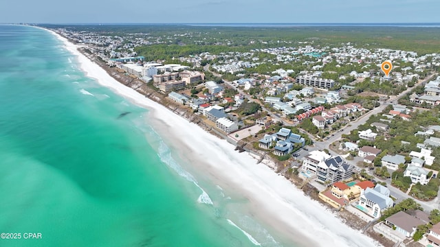 aerial view featuring a water view and a beach view