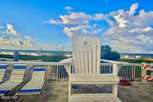 view of patio featuring a water view