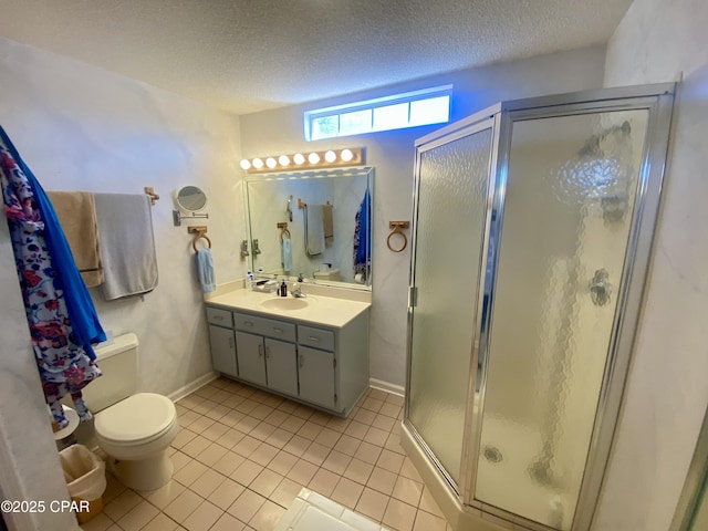 bathroom with walk in shower, tile patterned floors, toilet, a textured ceiling, and vanity