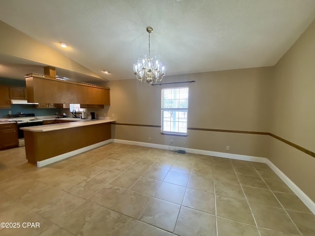 kitchen with lofted ceiling, hanging light fixtures, range with electric cooktop, light tile patterned flooring, and kitchen peninsula