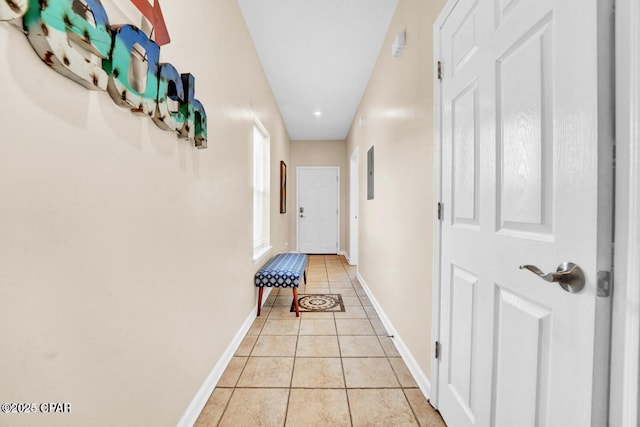 corridor with light tile patterned floors