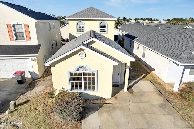 view of front of property featuring a garage