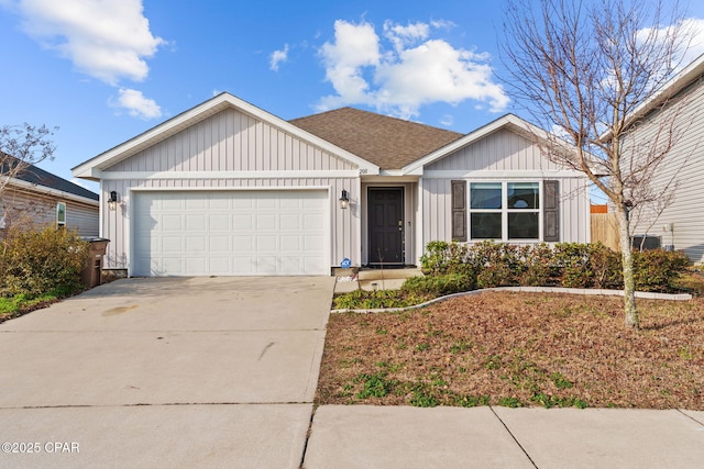 ranch-style house with board and batten siding, concrete driveway, and a garage