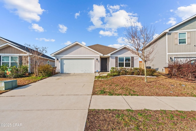 view of front of home featuring a garage, board and batten siding, and concrete driveway