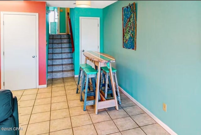 interior space with tile patterned floors