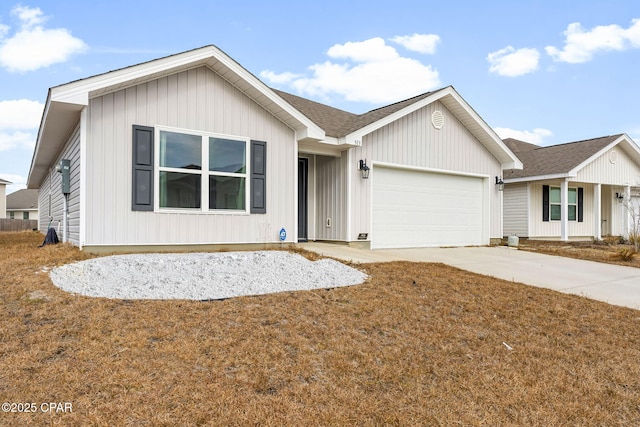 ranch-style house featuring a garage and a front lawn