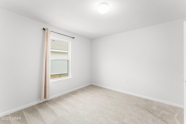 unfurnished room with carpet flooring