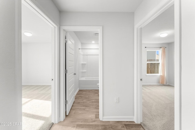 hallway featuring light hardwood / wood-style floors