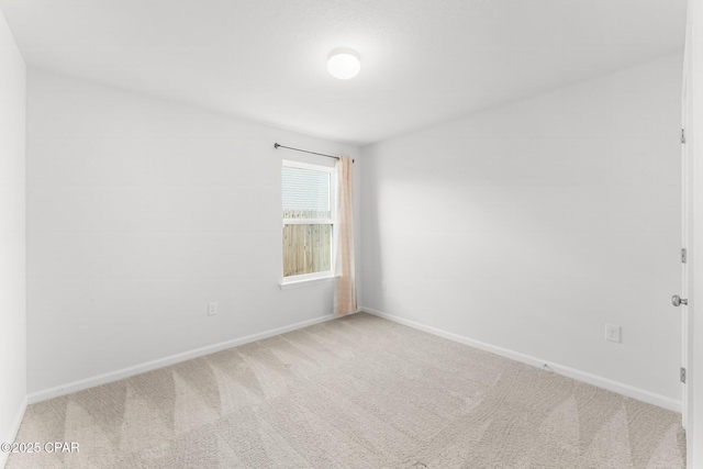 unfurnished room with carpet