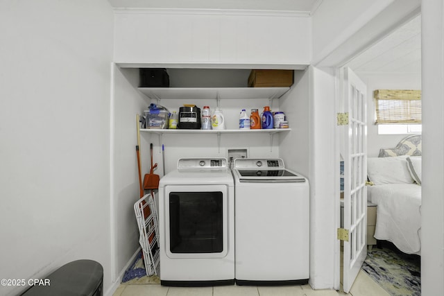 laundry area with separate washer and dryer