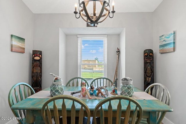 dining area featuring a chandelier