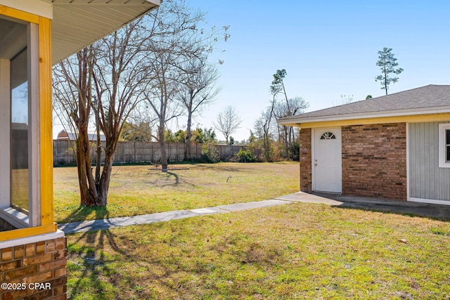 view of yard featuring fence