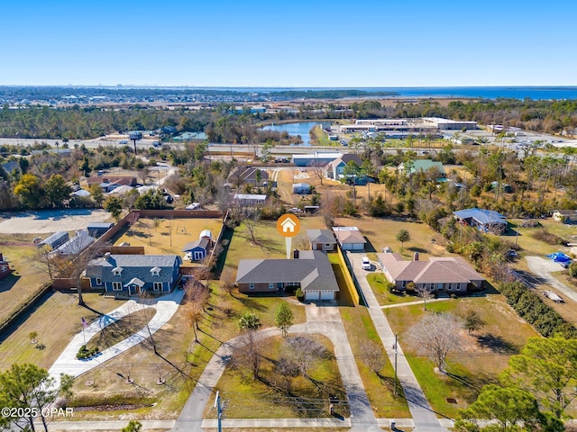 bird's eye view with a water view and a residential view