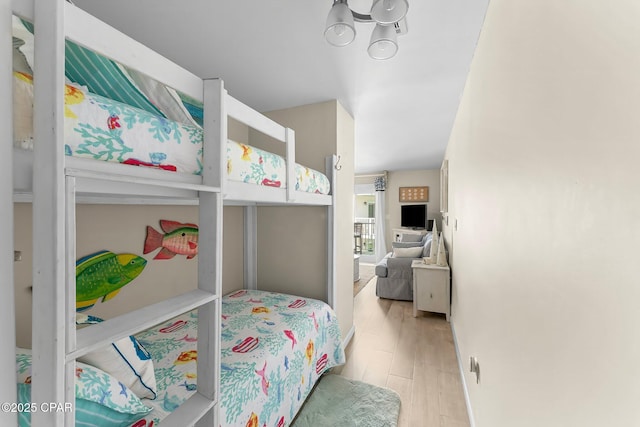 bedroom with light wood-type flooring
