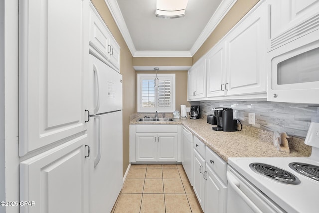 kitchen featuring white appliances, a sink, white cabinetry, backsplash, and crown molding