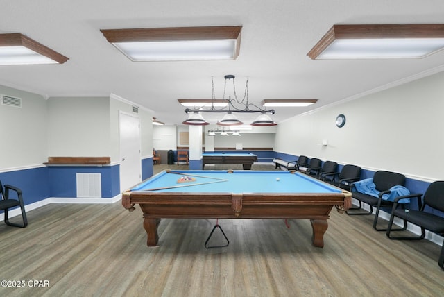 playroom featuring ornamental molding, pool table, visible vents, and wood finished floors