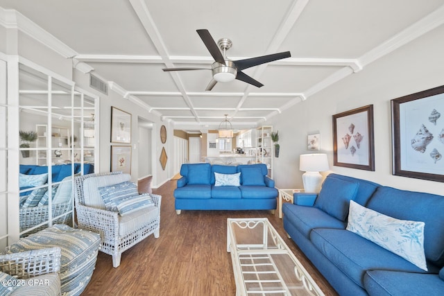 living room with a ceiling fan, visible vents, coffered ceiling, and wood finished floors