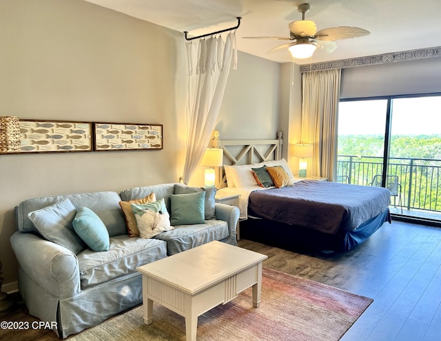 bedroom featuring access to exterior, wood-type flooring, and ceiling fan