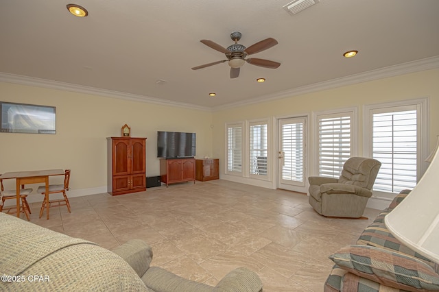 living room with ceiling fan and ornamental molding