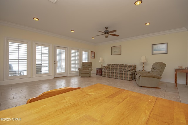 living room featuring ceiling fan, ornamental molding, and light tile patterned floors