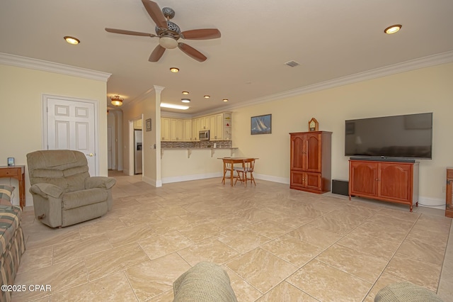 living room featuring crown molding and ceiling fan