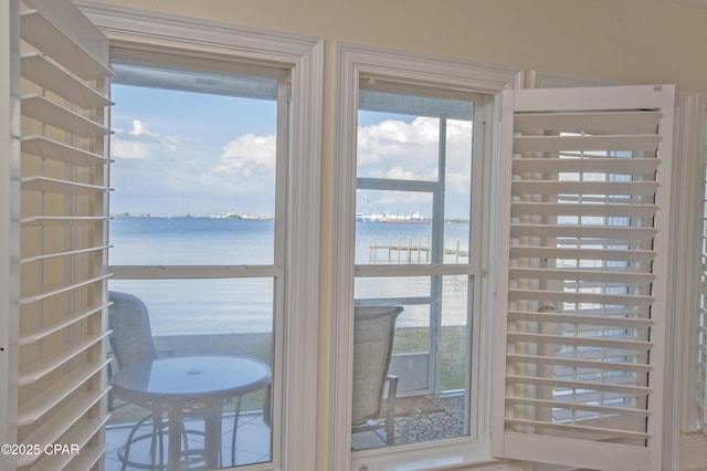 entryway with a water view