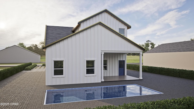 rear view of house featuring a patio area