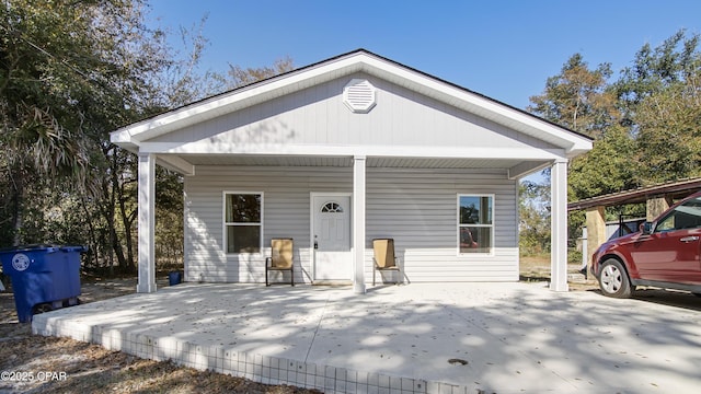 view of front of home featuring concrete driveway