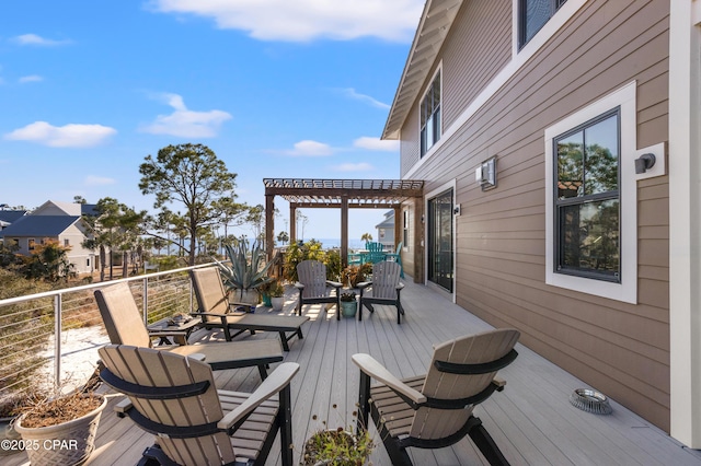 wooden terrace with a pergola