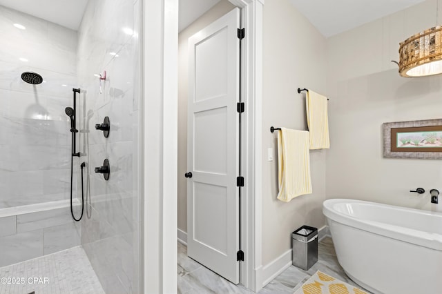 bathroom with shower with separate bathtub