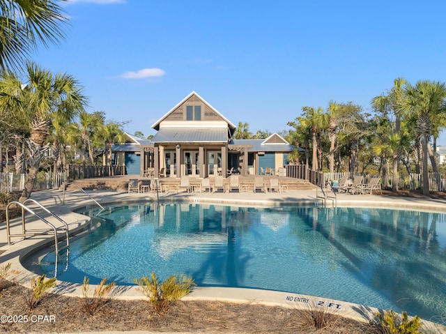 view of swimming pool featuring a patio area