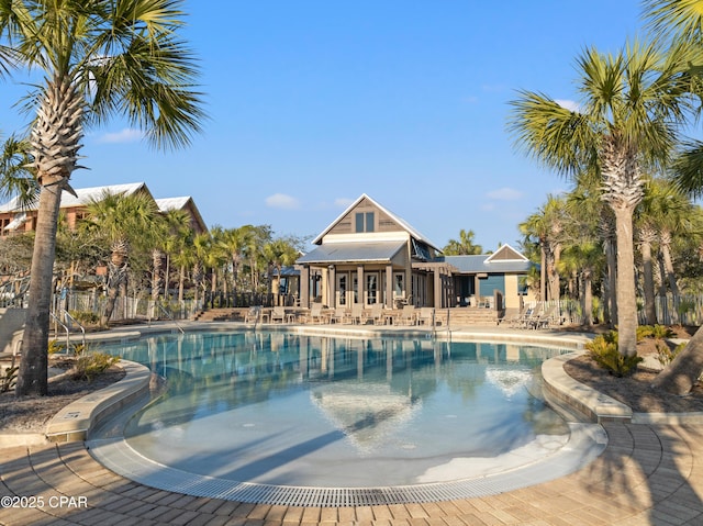 view of swimming pool with a patio area