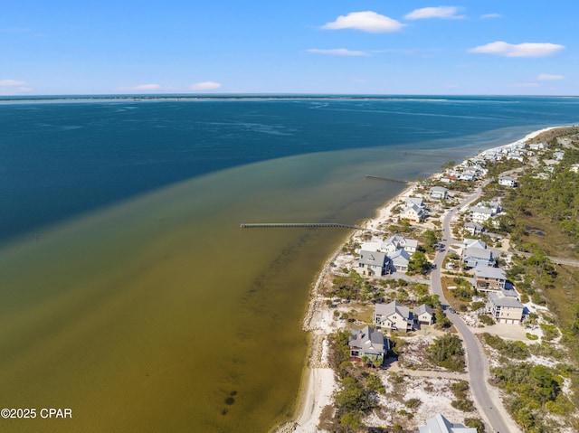 aerial view featuring a water view and a beach view