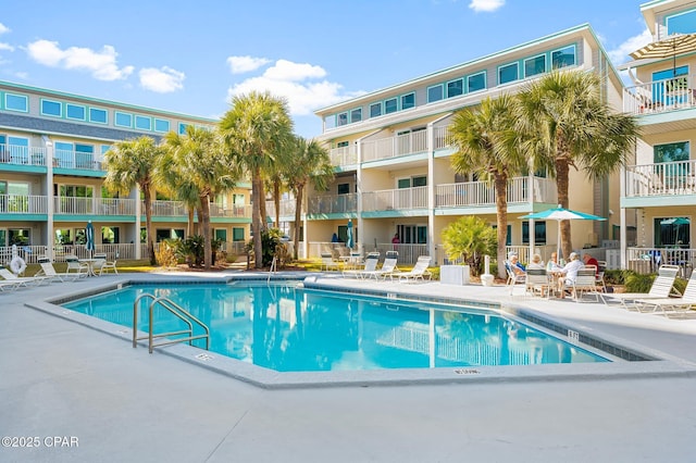 view of swimming pool featuring a patio