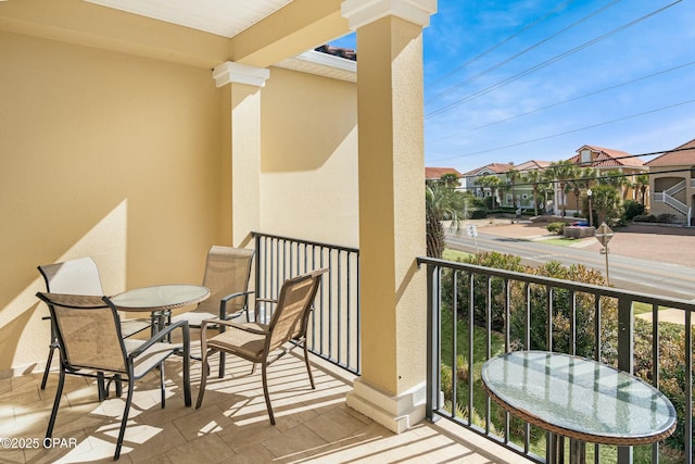 balcony featuring a residential view