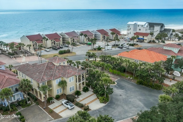 aerial view with a water view and a residential view