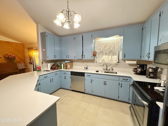 kitchen featuring a sink, blue cabinets, and stainless steel appliances