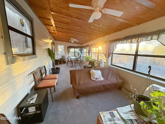 unfurnished sunroom featuring wooden ceiling and lofted ceiling