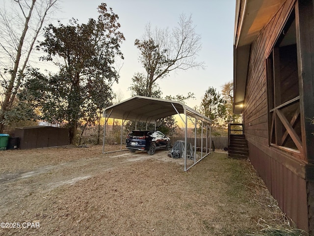 view of parking with a carport and driveway