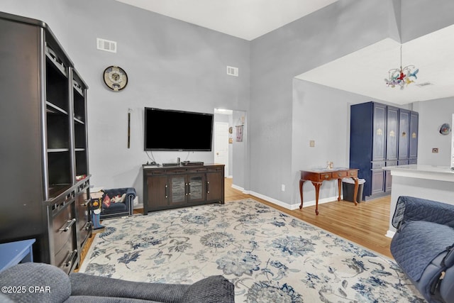 living room with light hardwood / wood-style flooring