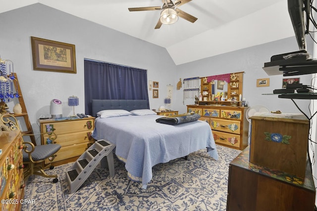 bedroom with lofted ceiling and ceiling fan