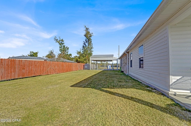 view of yard featuring a carport